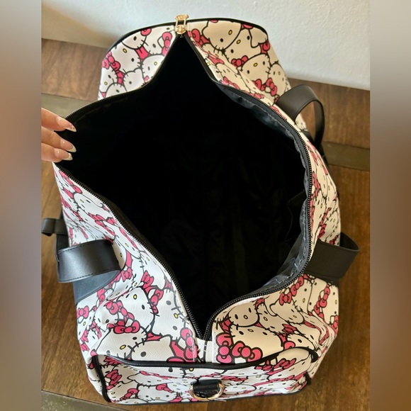 Hello Kitty | Bags | Hello Kitty Rolling Duffle Bag Luggage With Black ...